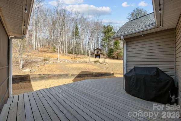 a view of a backyard of the house