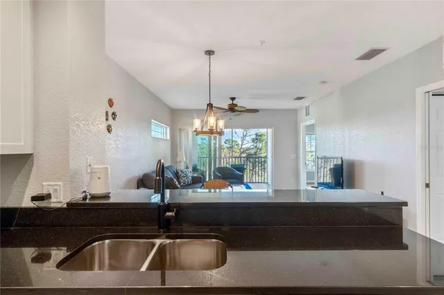 a bedroom with a bed and a dresser in it