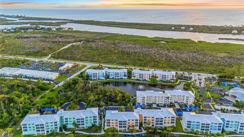 8409 Placida Road, Unit 405 Placida, FL 33946 - Photo 3 of 77 a view of a city with an ocean view