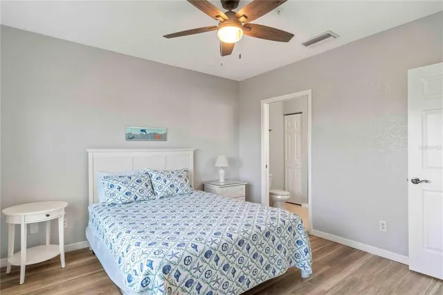 a bathroom with a sink toilet a mirror and shower