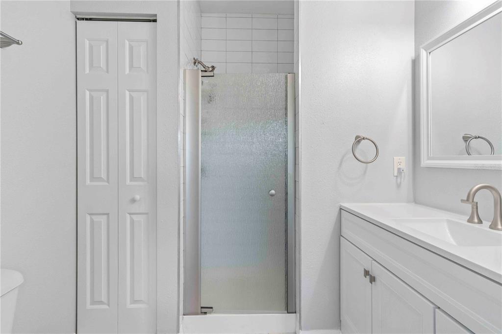 8409 Placida Road, Unit 405 Placida, FL 33946 - Photo 42 of 77 a bathroom with a sink and vanity