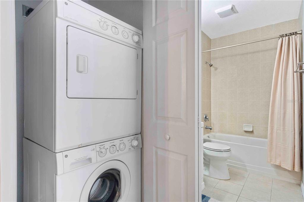 8409 Placida Road, Unit 405 Placida, FL 33946 - Photo 49 of 77 a white toilet sitting next to a bathroom sink