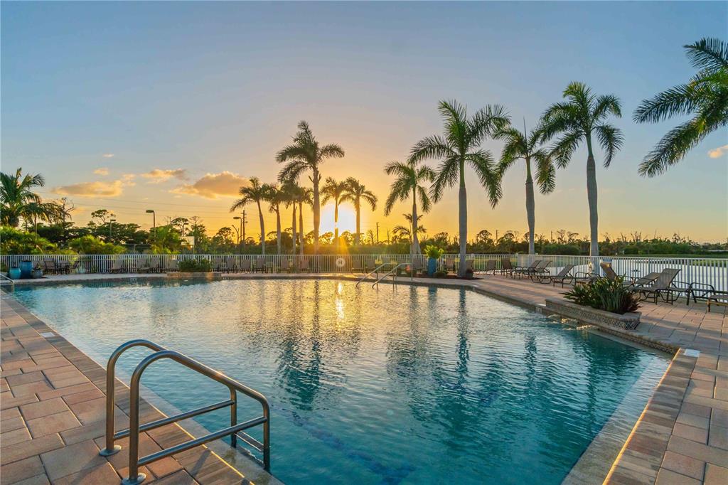 8409 Placida Road, Unit 405 Placida, FL 33946 - Photo 62 of 77 a view of a lake with outdoor seating