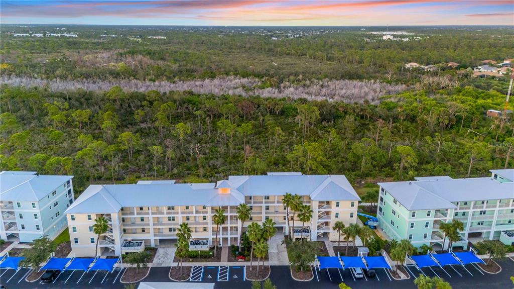 8409 Placida Road, Unit 405 Placida, FL 33946 - Photo 69 of 77 an aerial view of multiple house
