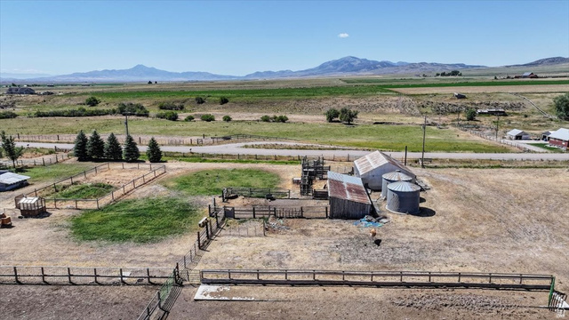 1634 West Arimo Road Arimo, ID 83214 - Photo 80 of 89 Agricultural property featuring multiple outbuildings, fenced enclosures, and a silo system