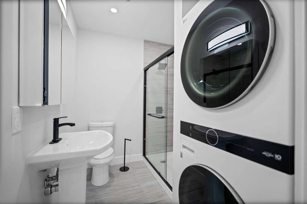 6 Garfield Avenue Revere, MA 02151 - Photo 19 of 29 a bathroom with a sink and a mirror