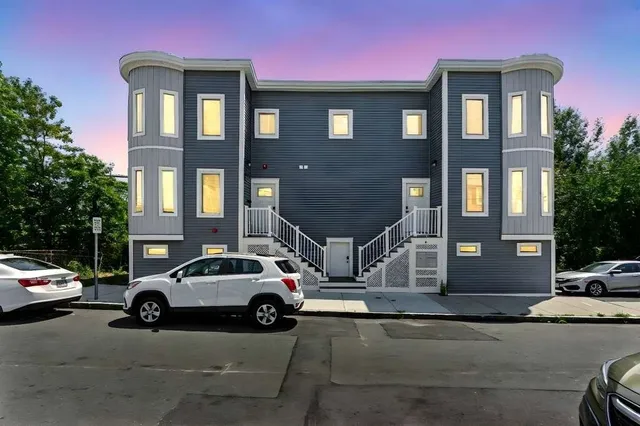 a car parked in front of a building