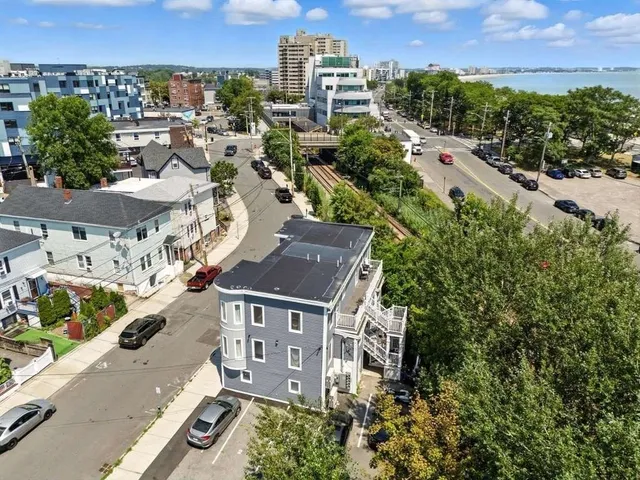 an aerial view of multiple house