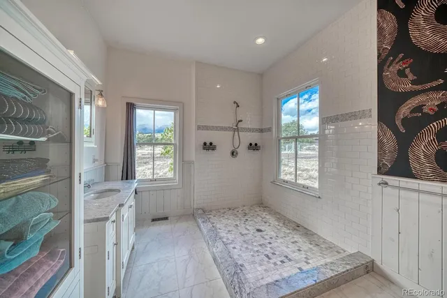 a bathroom with a bathtub sink and toilet
