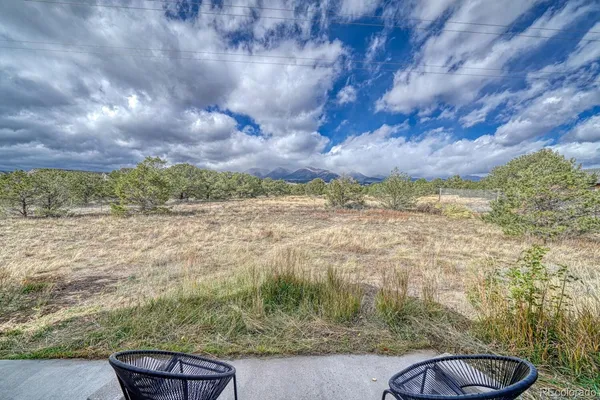 a view of a lake with a yard
