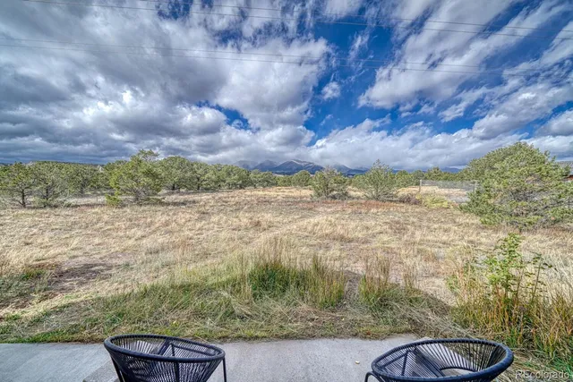 a view of a lake with a yard