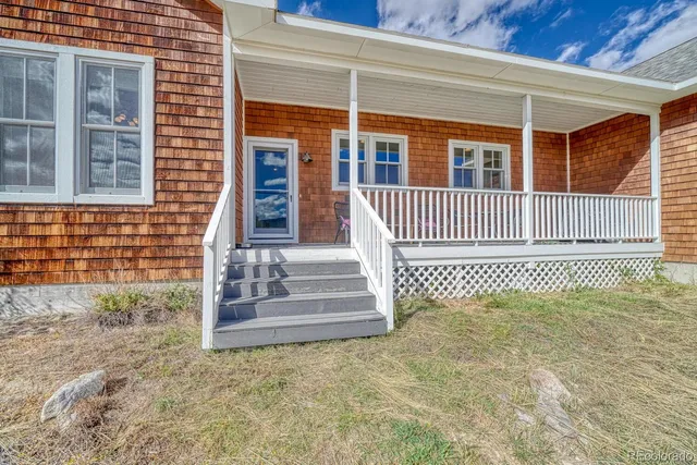 a porch with a bench