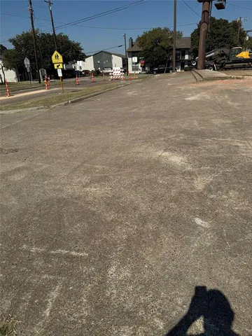 a view of a lake with a yard