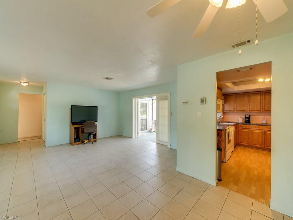 Living Area has French Doors to Screened Porch.