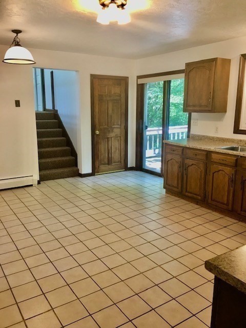 147 East County Road Rutland, MA 01543 - Photo 6 of 17 a kitchen with a sink and cabinets
