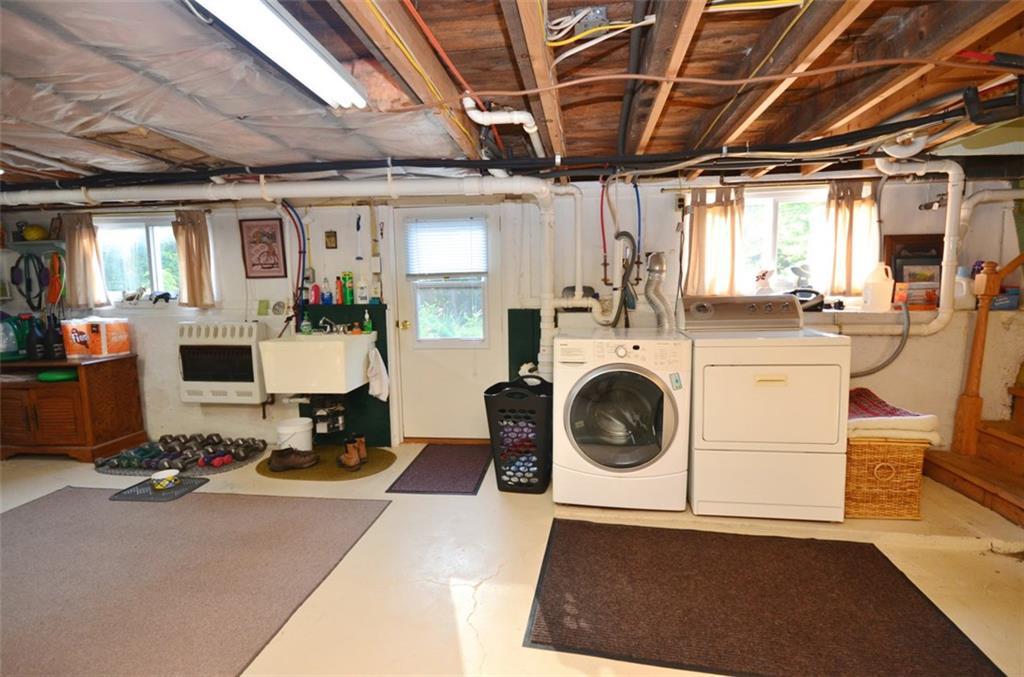 427 Runaround Pond Road Durham, ME 04222 - Photo 23 of 35 Wall mounted propane heater keeps...