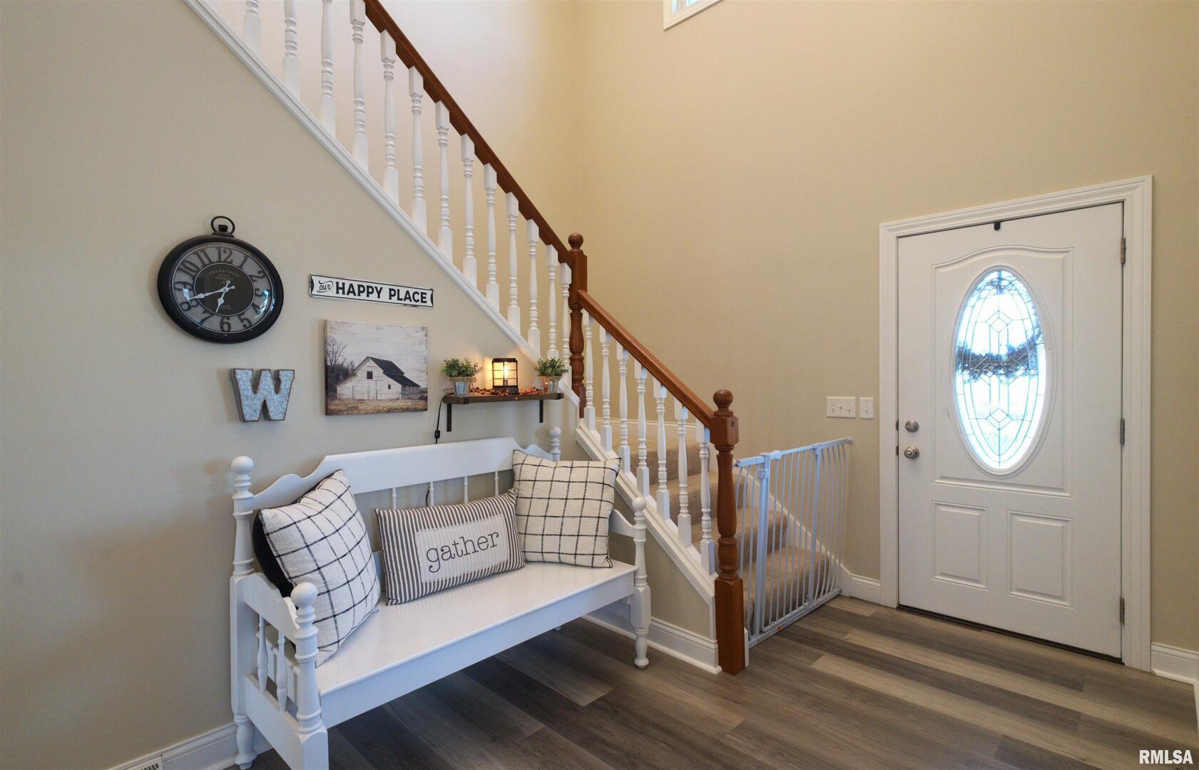 1917 11th Street Camanche, IA 52730 - Photo 4 of 40 a view of entryway with wooden floor