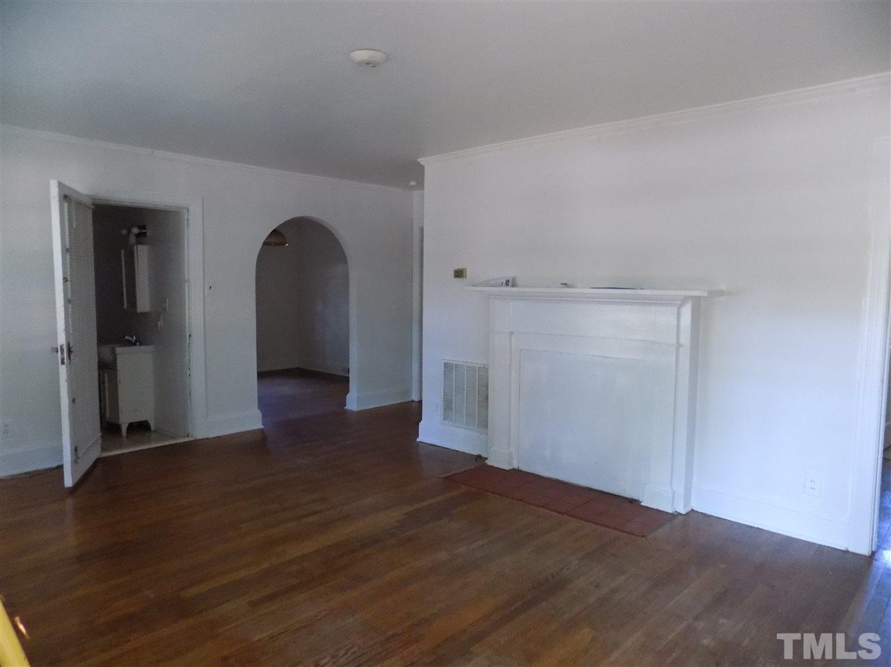 1114 Kent Road Raleigh, NC 27606 - Photo 2 of 10 a view of a room with wooden floor