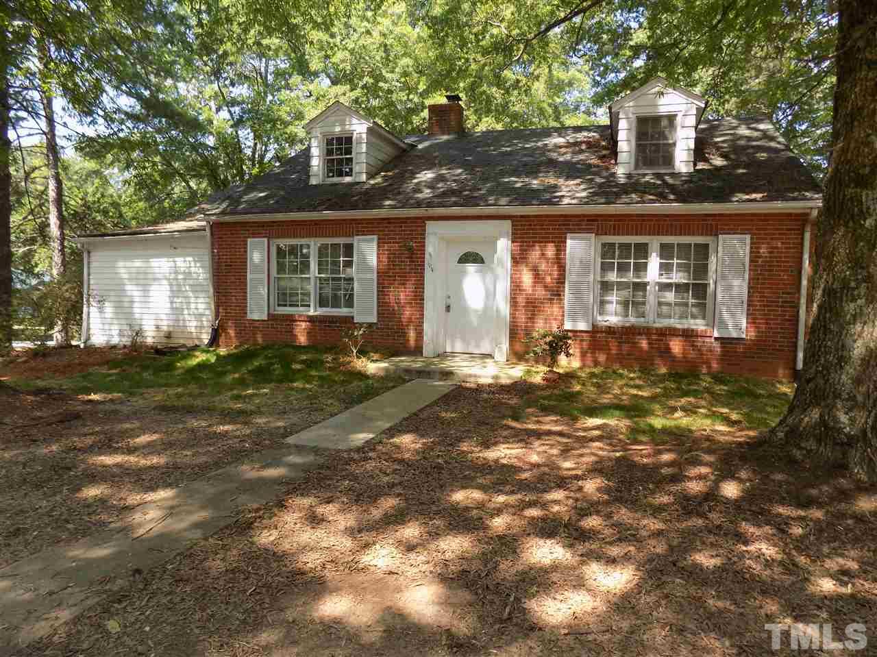 1114 Kent Road Raleigh, NC 27606 - Photo 10 of 10 front view of a house with a yard