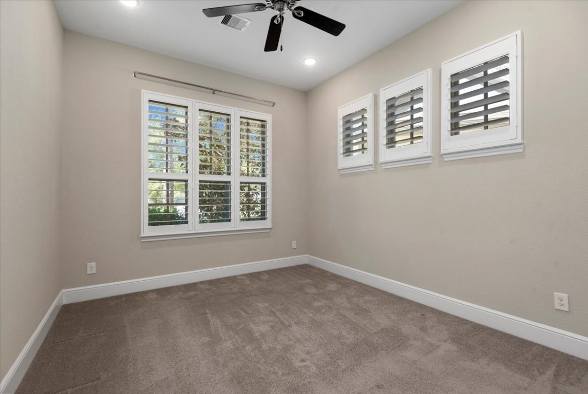 155 Rockwell Park Spring, TX 77389 - Photo 8 of 50 This guest suite features a spacious, well-organized walk-in closet, perfect for accommodating visitors with ample storage and style.