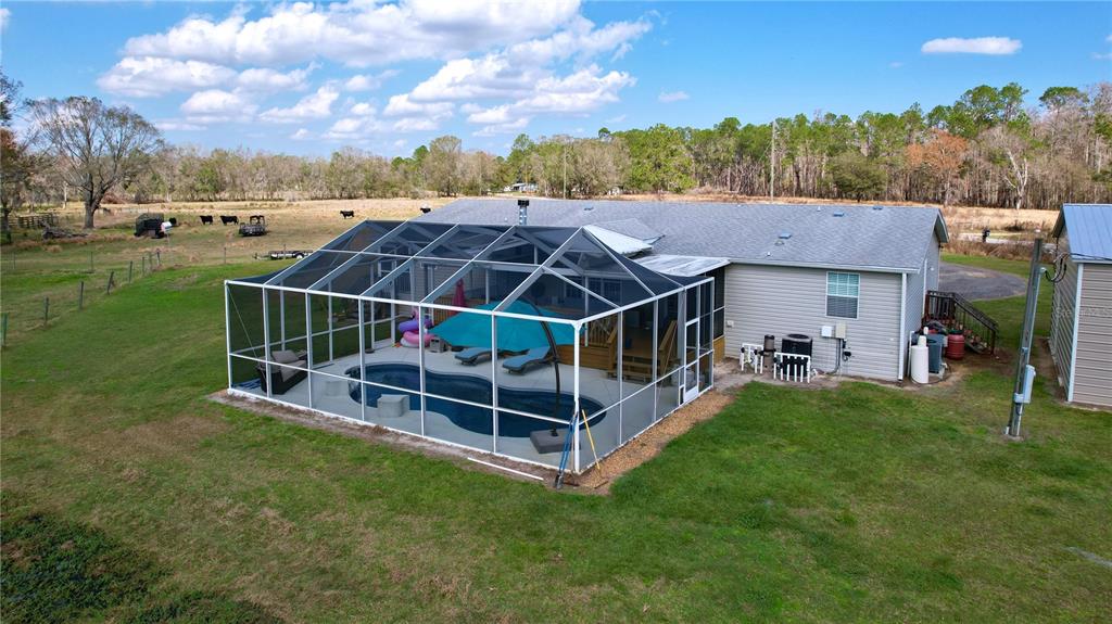 14890 County Road 757 Webster, FL 33597 - Photo 2 of 100 a view of a house with backyard and deck