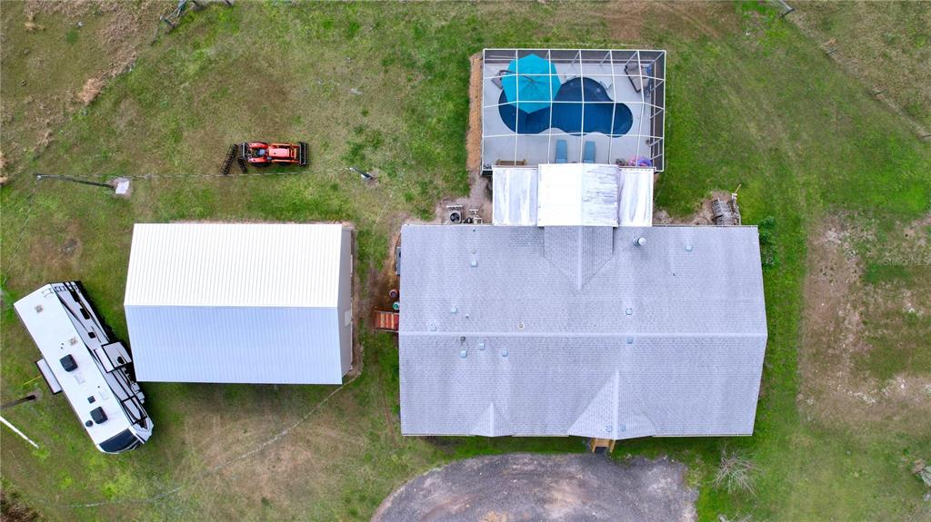 14890 County Road 757 Webster, FL 33597 - Photo 23 of 100 an aerial view of a house with yard swimming pool and outdoor seating