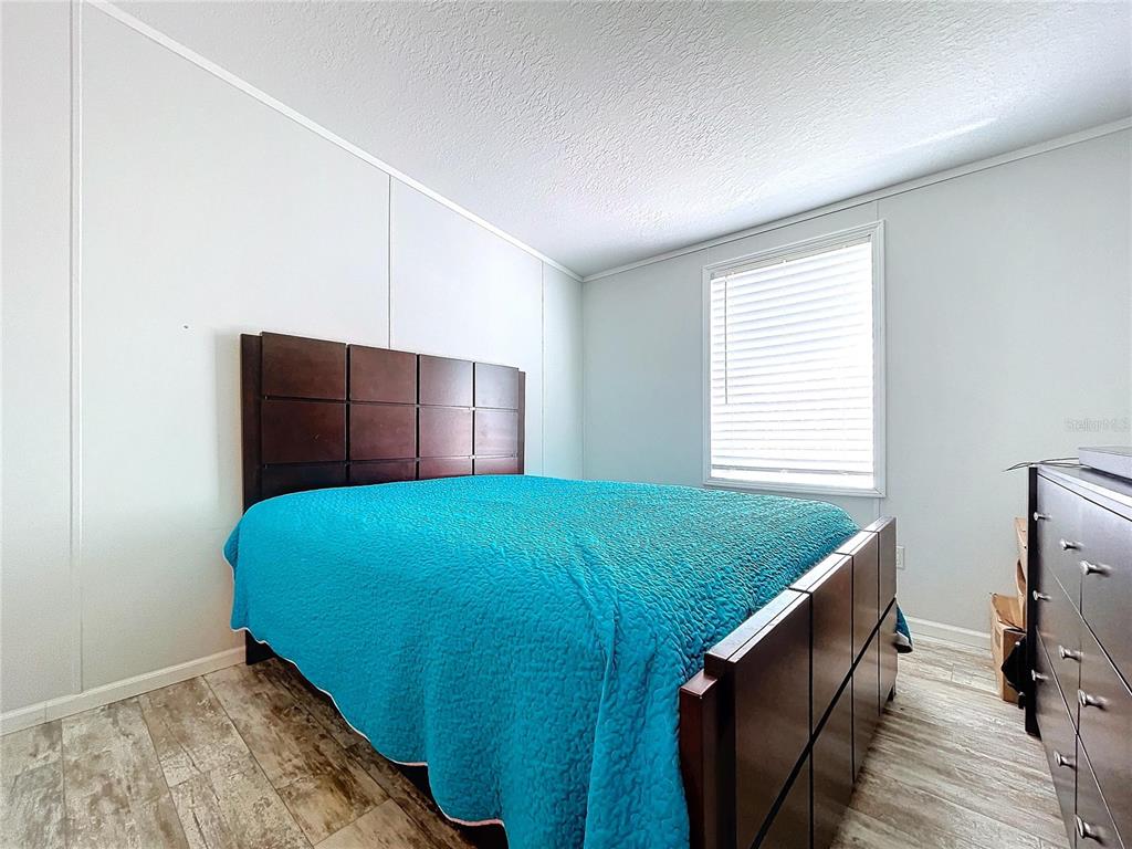 14890 County Road 757 Webster, FL 33597 - Photo 49 of 100 a bedroom with a bed and a window