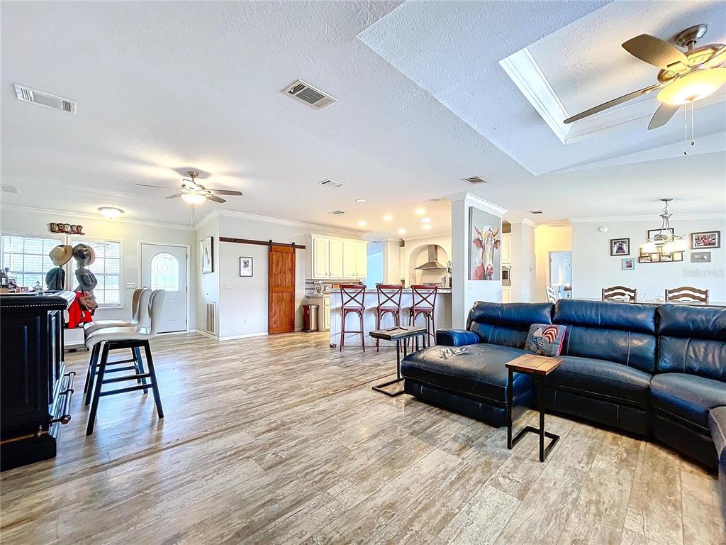 14890 County Road 757 Webster, FL 33597 - Photo 81 of 100 a living room with furniture and a wooden floor
