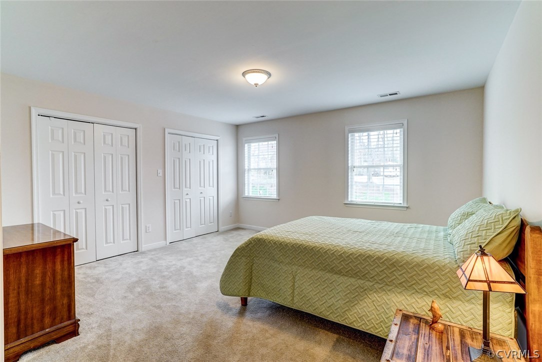 13001 Chipstead Road Chester, VA 23831 - Photo 17 of 31 a bedroom with a bed and a window