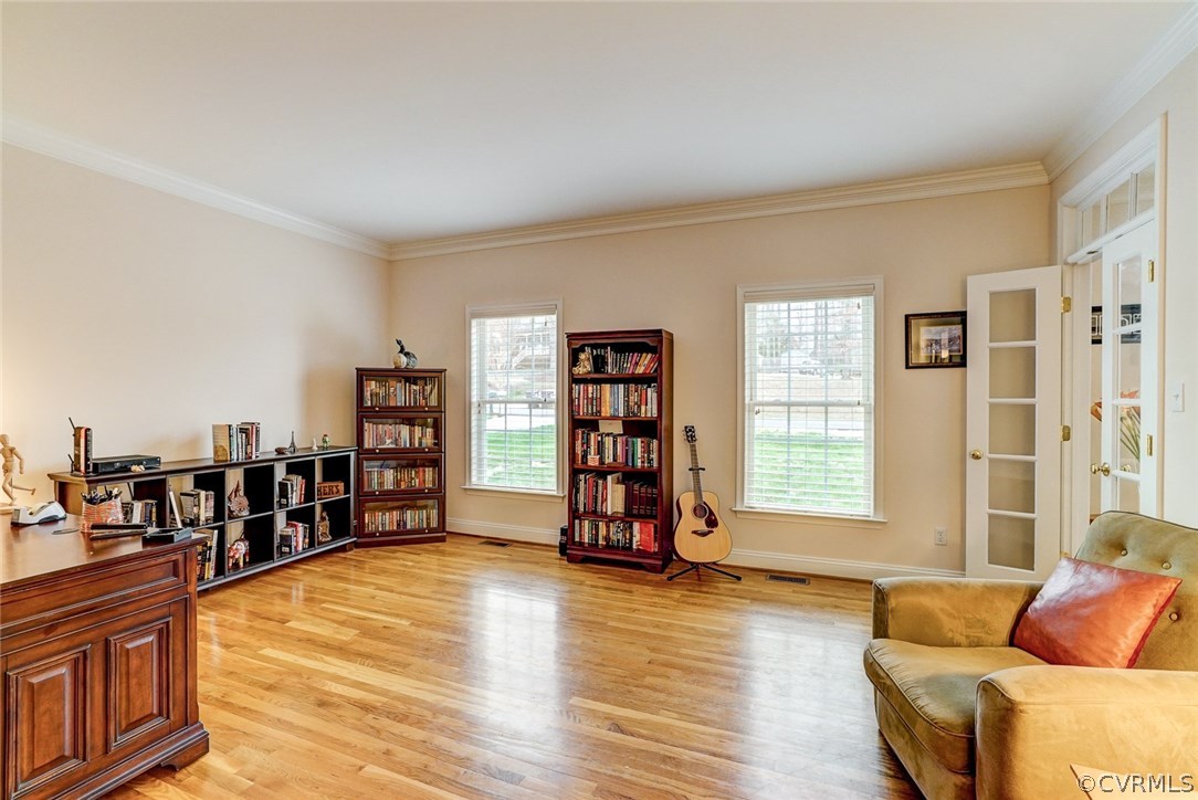 13001 Chipstead Road Chester, VA 23831 - Photo 5 of 31 a living room with furniture and a wooden floor