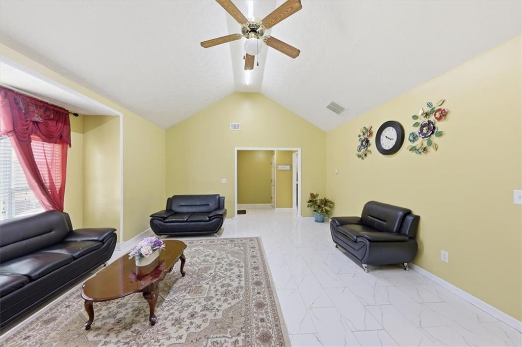 109 Tyler Way Jackson, GA 30233 - Photo 11 of 44 a living room with furniture and a rug