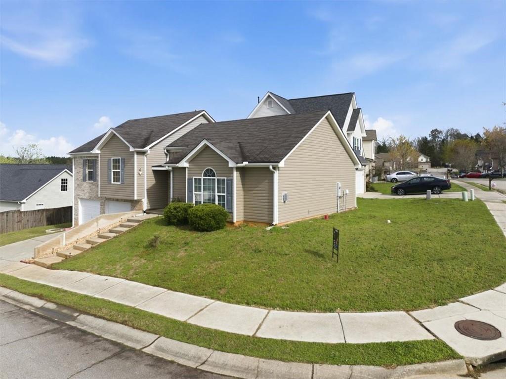 109 Tyler Way Jackson, GA 30233 - Photo 3 of 44 a view of house with garden