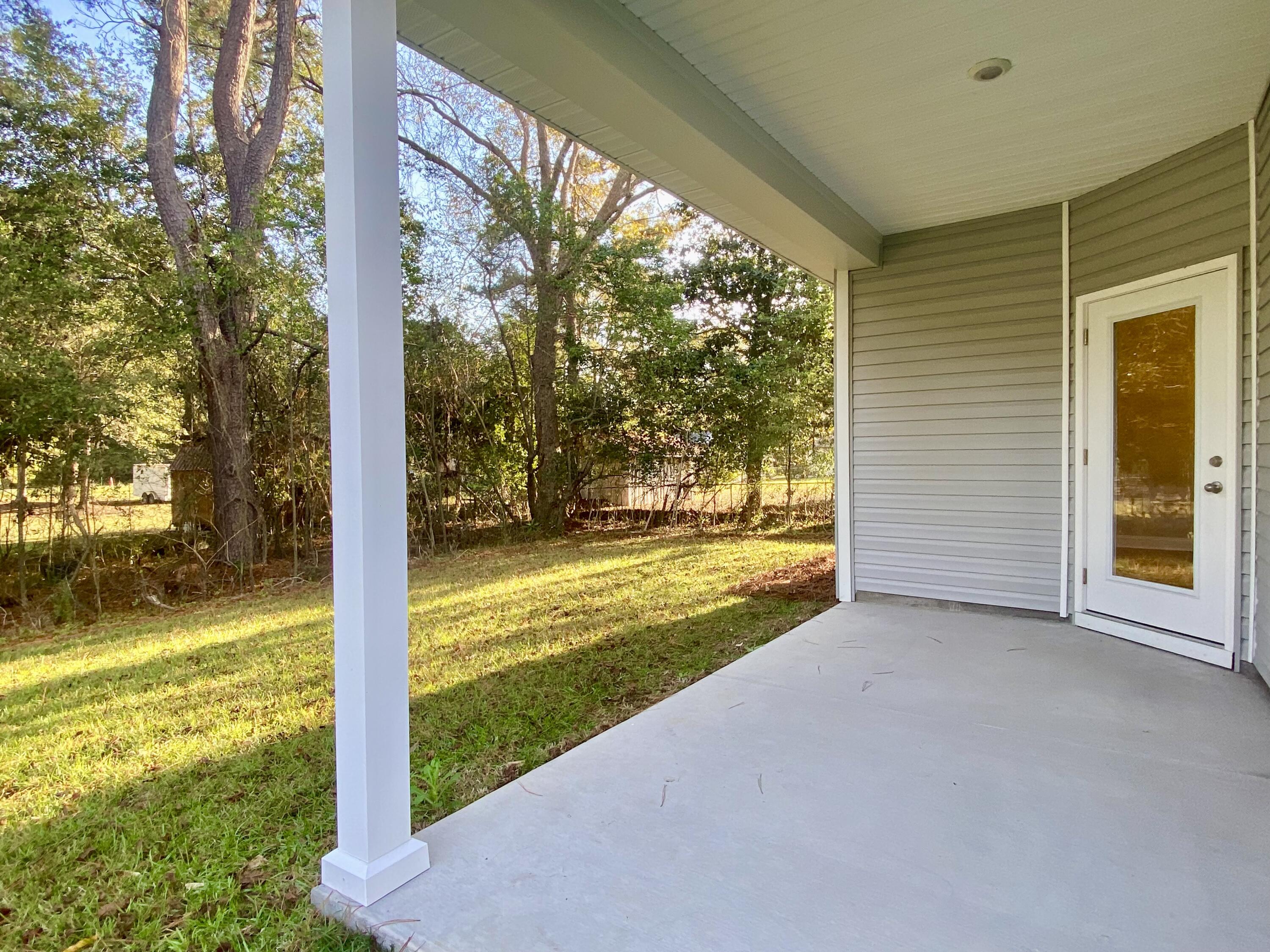 1102 Graham Street St. Stephen, SC 29479 - Photo 32 of 41 Covered Back Porch