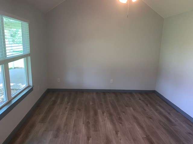 1501 North Burleson Street Kyle, TX 78640 - Photo 21 of 33 a view of an empty room and window