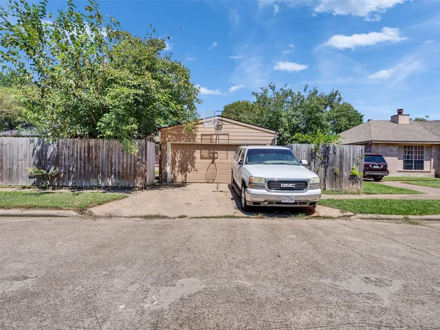 a car parked in front of a house