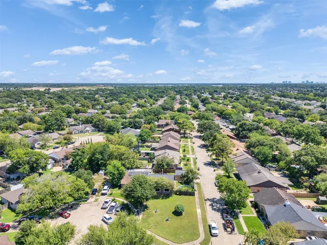 an aerial view of multiple house