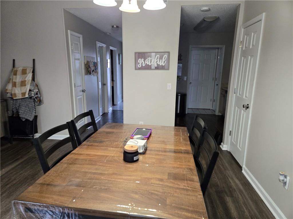 17 Benfield Circle Southeast Cartersville, GA 30121 - Photo 19 of 23 a bed room with a bed and furniture