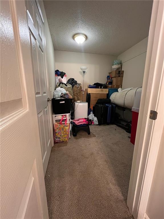17 Benfield Circle Southeast Cartersville, GA 30121 - Photo 21 of 23 a living room with furniture and cars
