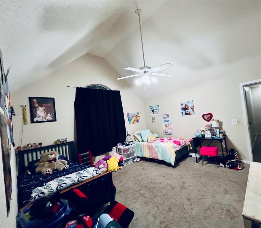 17 Benfield Circle Southeast Cartersville, GA 30121 - Photo 22 of 23 a bedroom with furniture and a chandelier fan