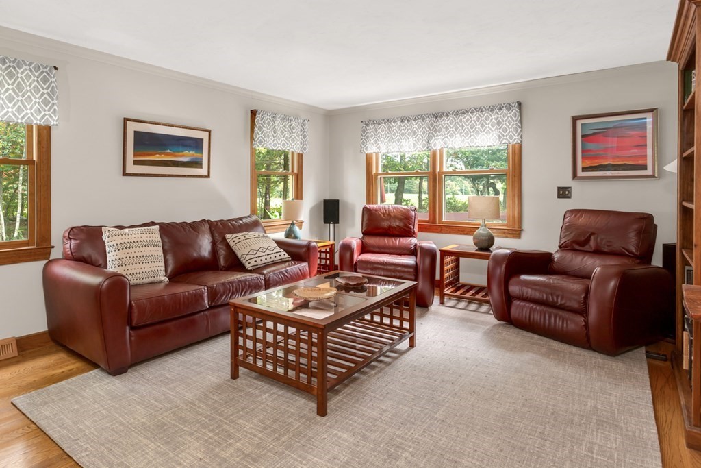 8 Mill River Drive Mendon, MA 01756 - Photo 11 of 42 a living room with furniture and a large window