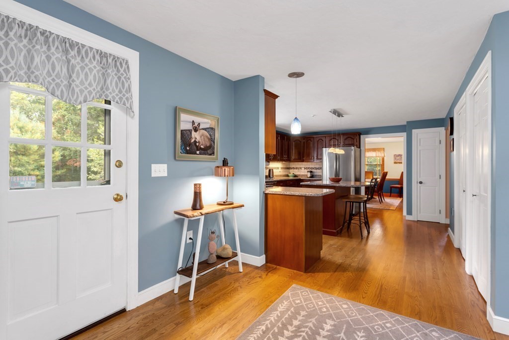 8 Mill River Drive Mendon, MA 01756 - Photo 18 of 42 a view of a living room and dining room