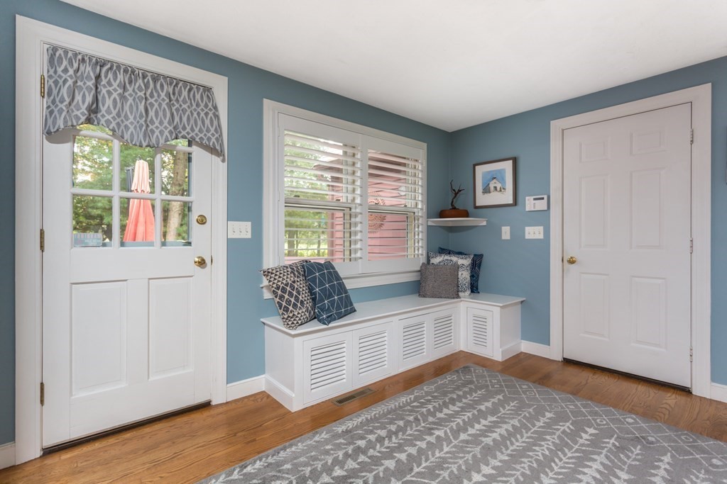 8 Mill River Drive Mendon, MA 01756 - Photo 20 of 42 a view of a room that has a bed and a table in it