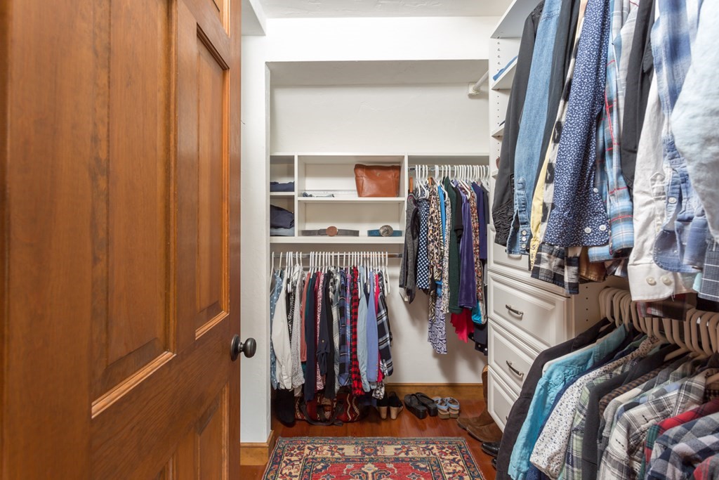 8 Mill River Drive Mendon, MA 01756 - Photo 25 of 42 a view of walk in closet with clothes and shoes