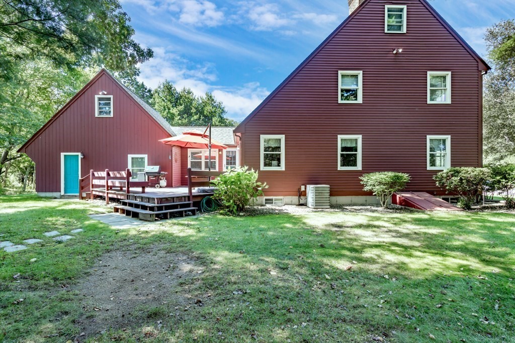 8 Mill River Drive Mendon, MA 01756 - Photo 37 of 42 a backyard of a house with seating space
