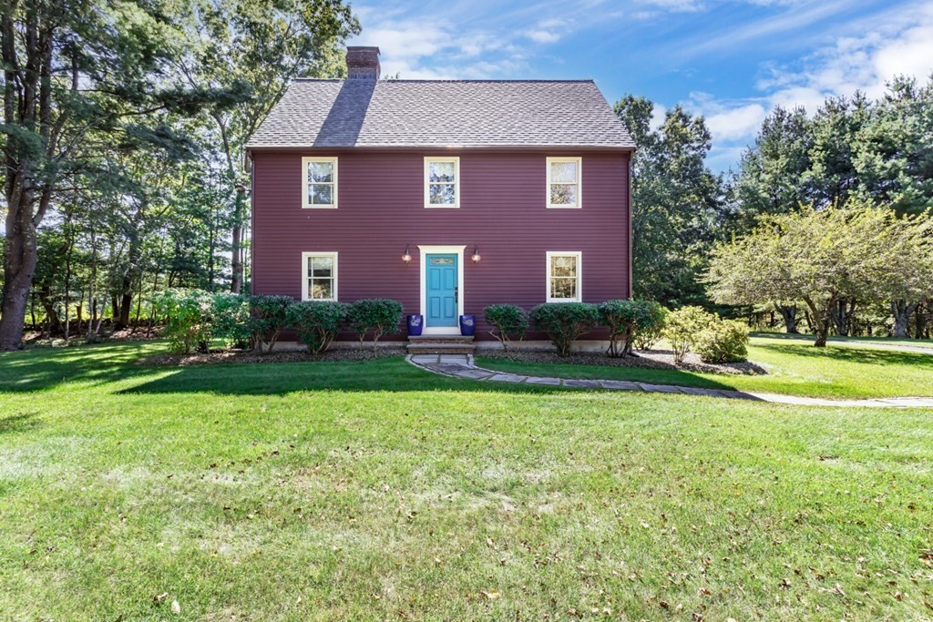 8 Mill River Drive Mendon, MA 01756 - Photo 41 of 42 a front view of a house with garden