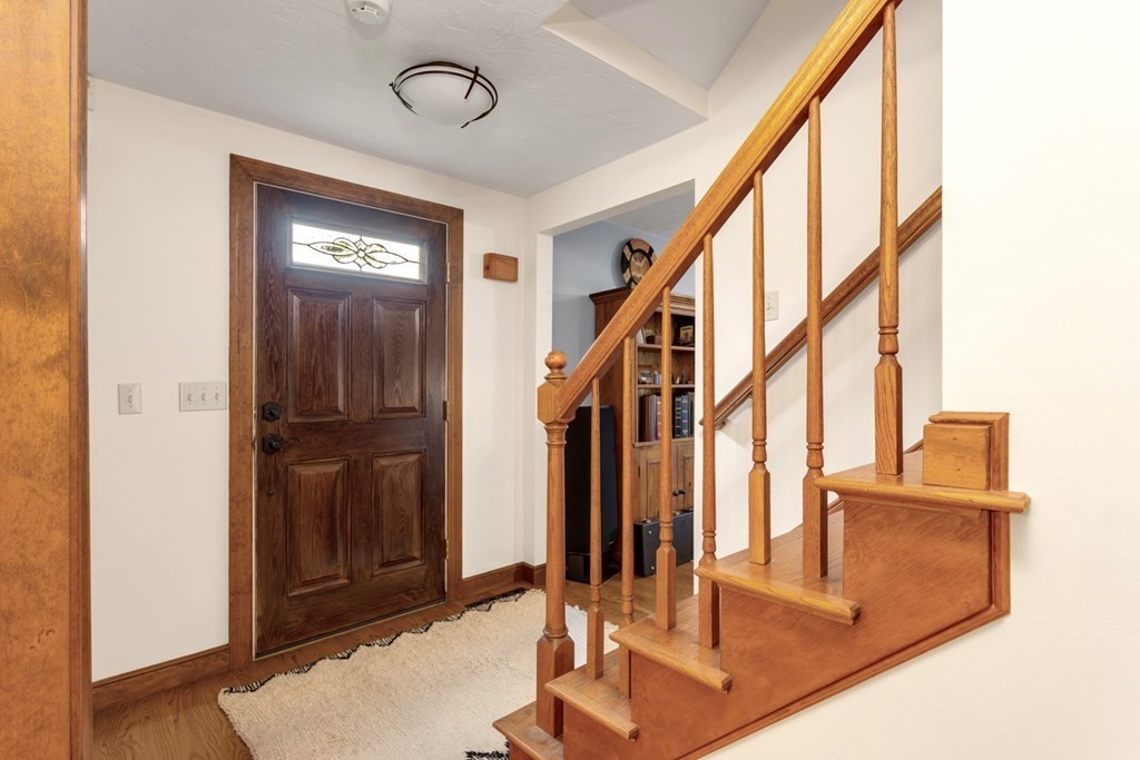 8 Mill River Drive Mendon, MA 01756 - Photo 6 of 42 a view of entryway and hall with wooden floor
