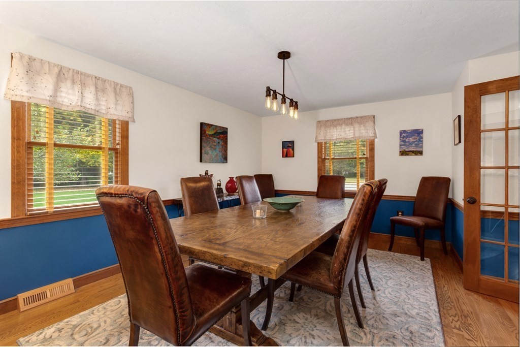 8 Mill River Drive Mendon, MA 01756 - Photo 7 of 42 a view of a dining room with furniture window and wooden floor