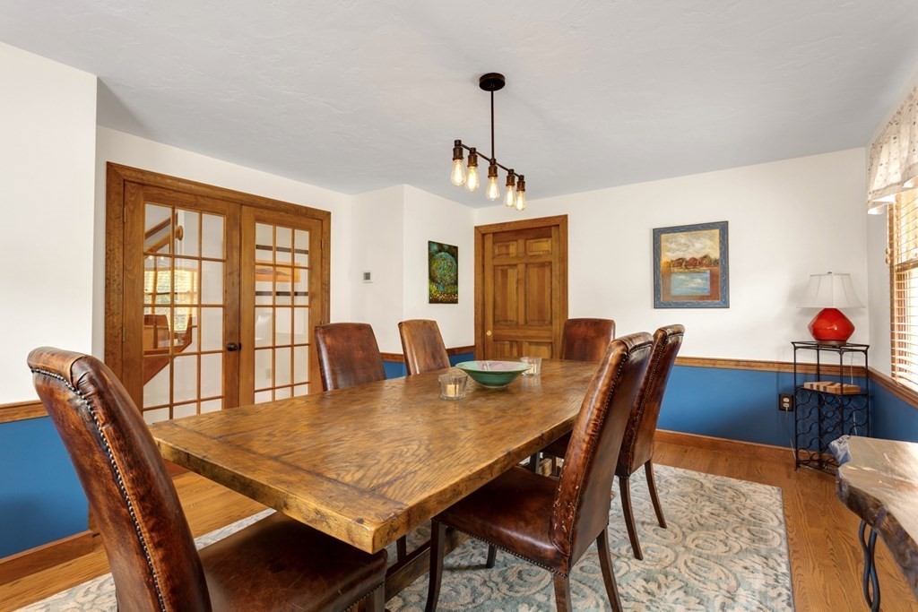 8 Mill River Drive Mendon, MA 01756 - Photo 8 of 42 a view of a dining room with furniture window and wooden floor