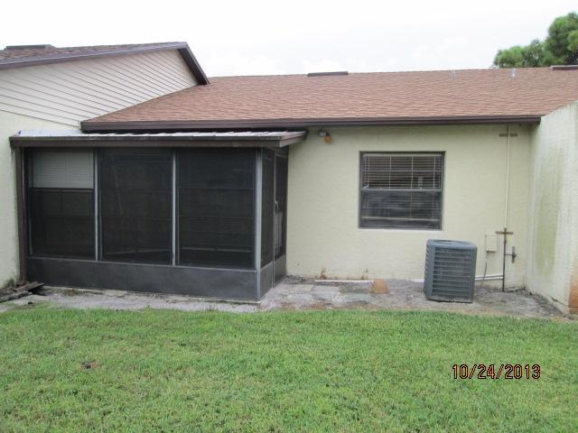 6010 Indrio Road, Unit D2 Fort Pierce, FL 34946 - Photo 10 of 10 EXTERIOR BACK