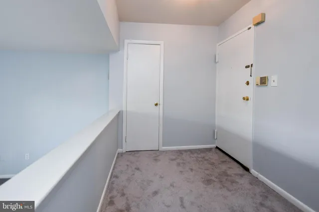 a kitchen with a cabinets and a stove top oven